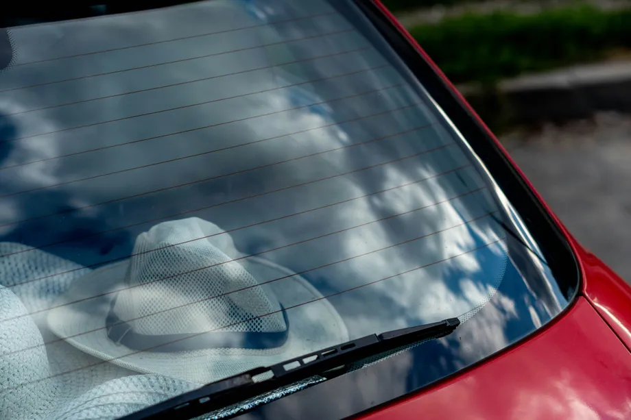 Beautiful tinted windshield of a red car